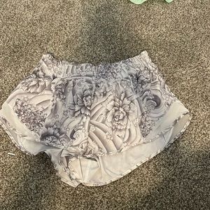 floral gray Lululemon Athletica shorts would fit size 2 to 4